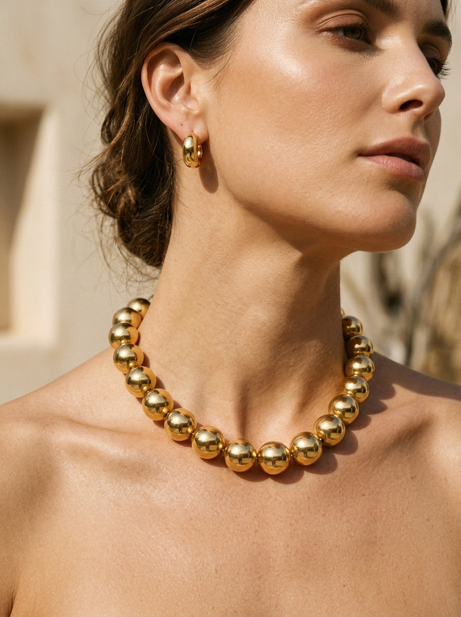 Statement gold beaded necklace