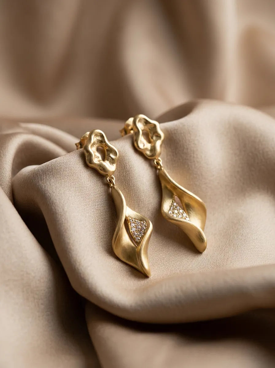 Avirena sculptural drop earrings on silk
